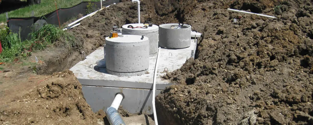 Septic system repair and installation site with tank access ports in Knoxville, TN